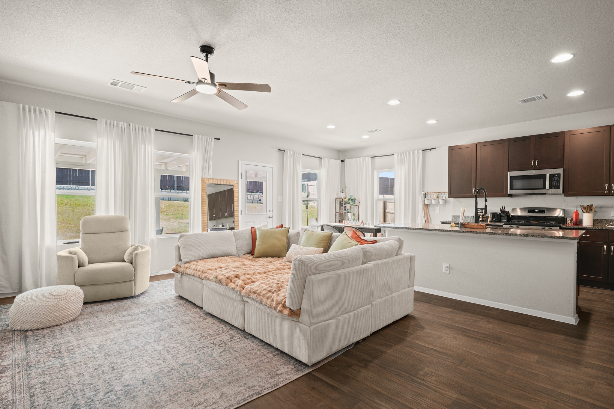 Open living and kitchen at 5521 Sacra Cove